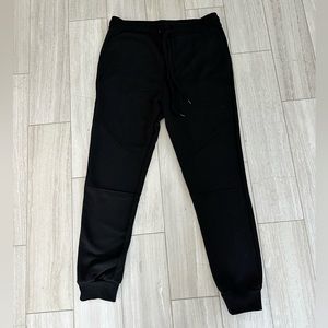 Fashion Nova Men, black jogger with back zipper pockets, size L